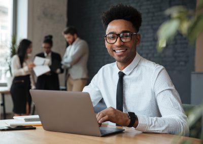 Happy young african businessman